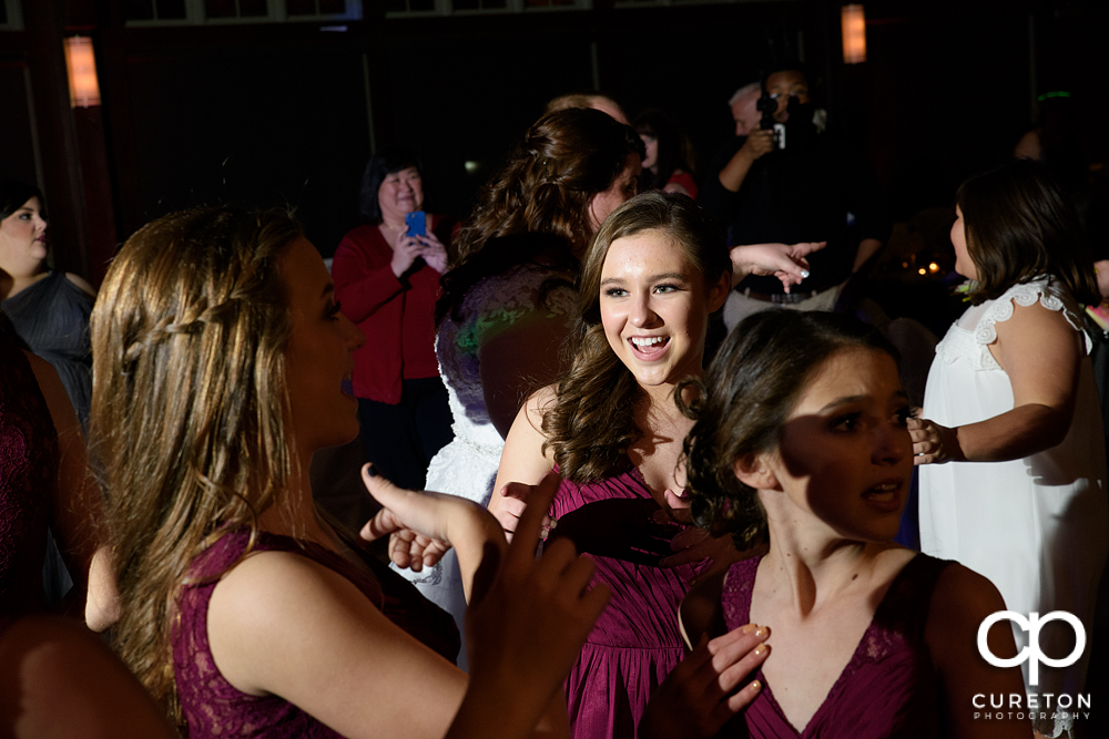 Wedding guests dancing to Uptown Entertainment.