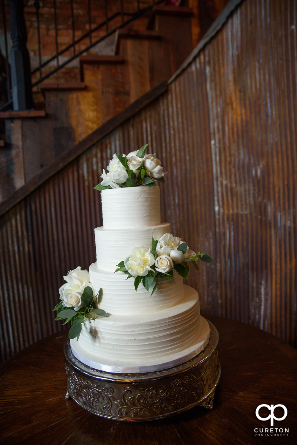 Wedding cake by Couture Cakes in Greenville.