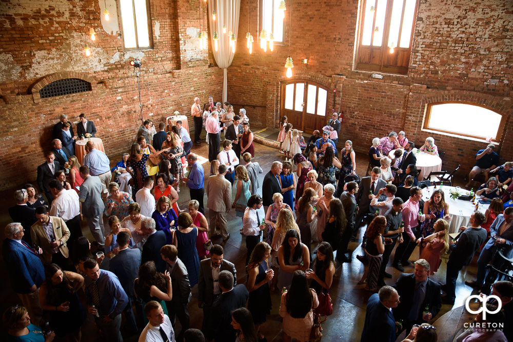 Wedding guests packed the main hall at The Old Cigar Warehouse for the reception.