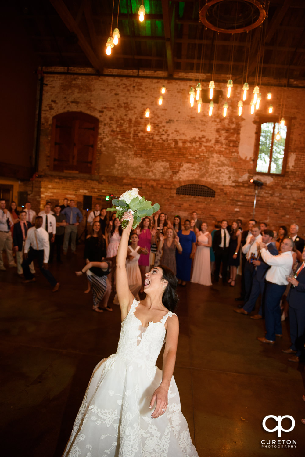 Bride tossing the bouquet.