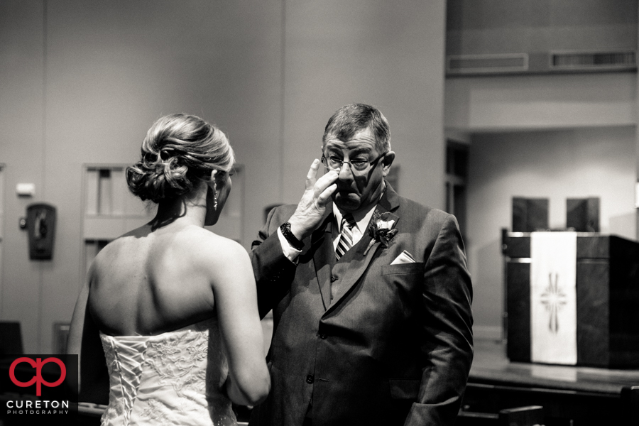 Dad crying during the father and bride first look.