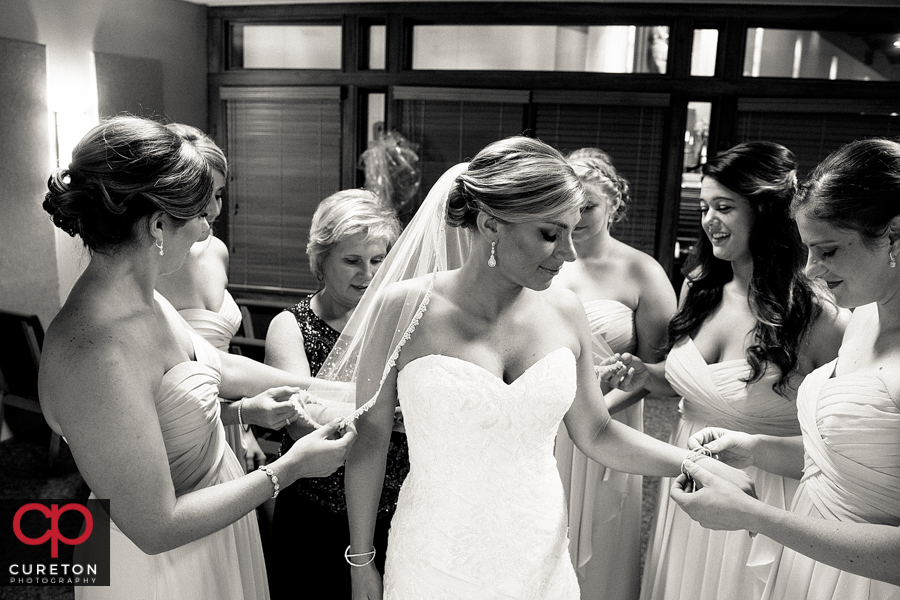 Black and white of bride and her bridesmaids.