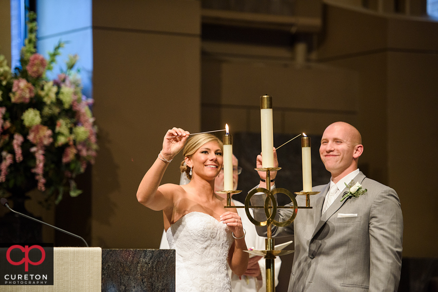 Bride and groom during the ceremony at St. Mary's church in Greenville,SC.