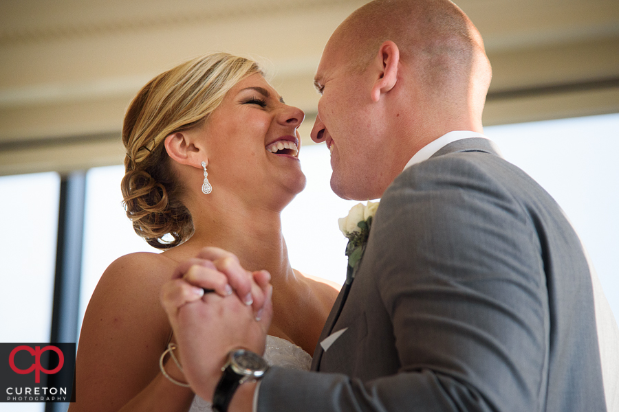 Bride and groom first dance at the Commerce Club reception.