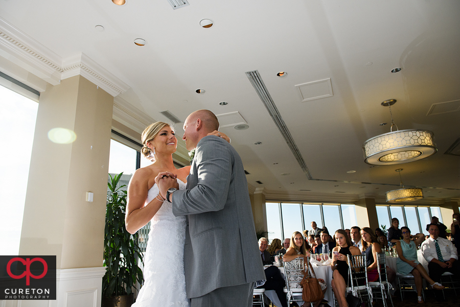 Bride and groom first dance at the Commerce Club reception.