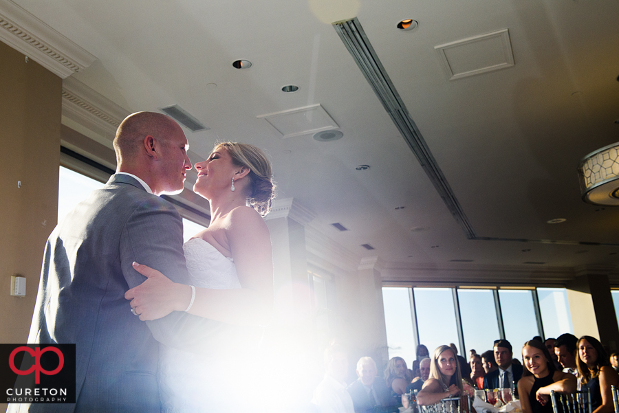 Bride and groom first dance at the Commerce Club reception.