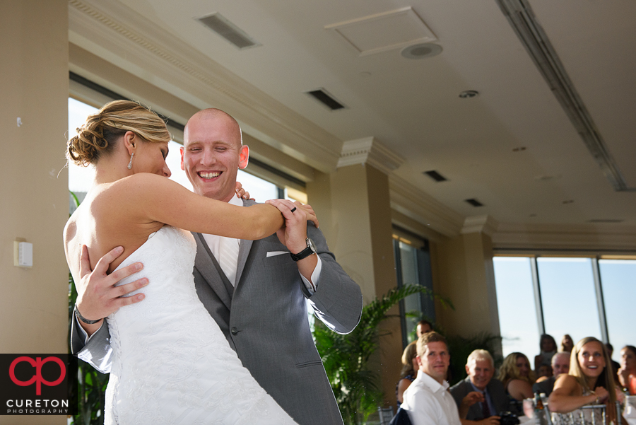 Bride and groom first dance at the Commerce Club reception.