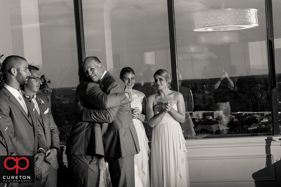 Groom's father gives a speech.