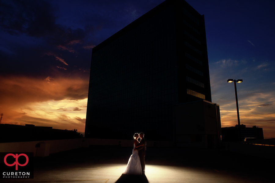Bride and groom at sunset at their Commerce Club wedding.