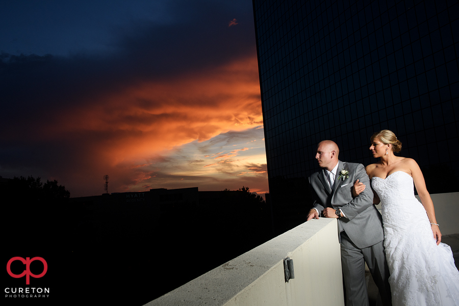 Bride and groom at sunset at their Commerce Club wedding.