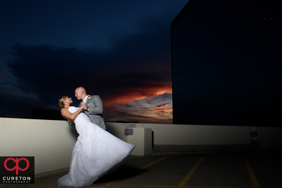 Bride and groom at sunset at their Commerce Club wedding.
