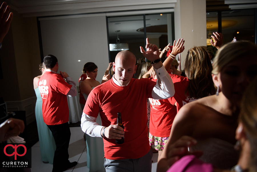 Guests dancing to the sounds of Pros Only DJ at the wedding reception.