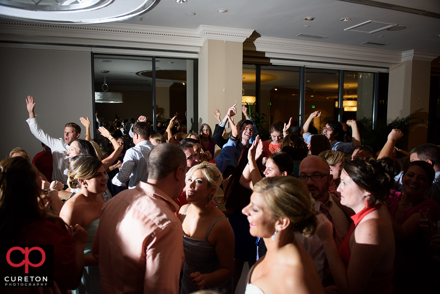 Guests dancing to the sounds of Pros Only DJ at the wedding reception.