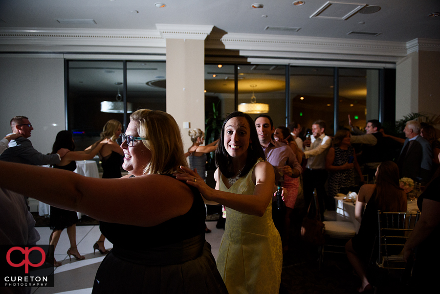 Guests dancing to the sounds of Pros Only DJ at the wedding reception.