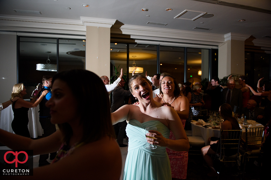 Guests dancing to the sounds of Pros Only DJ at the wedding reception.