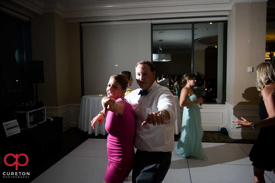Guests dancing to the sounds of Pros Only DJ at the wedding reception.