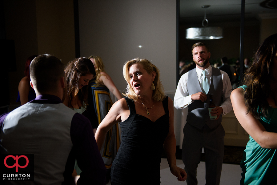 Guests dancing to the sounds of Pros Only DJ at the wedding reception.