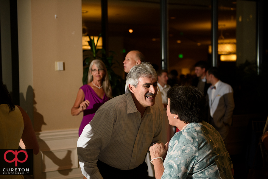 Guests dancing to the sounds of Pros Only DJ at the wedding reception.