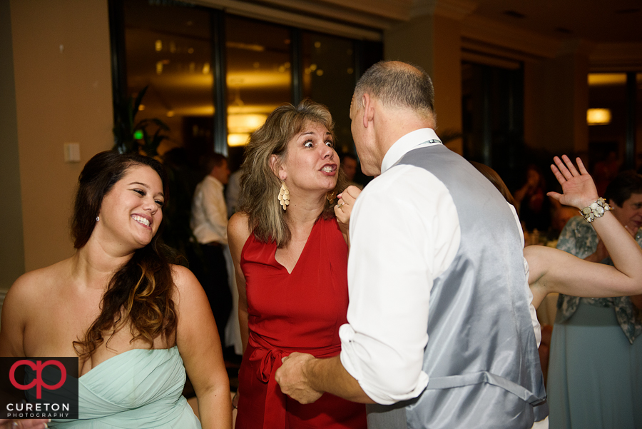 Guests dancing to the sounds of Pros Only DJ at the wedding reception.