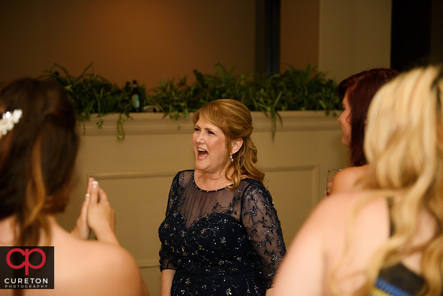 Guests dancing to the sounds of Pros Only DJ at the wedding reception.