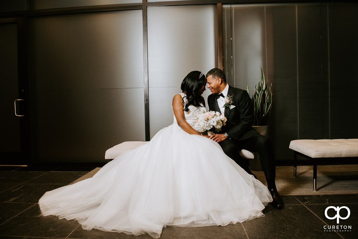 Bride and groom after the wedding ceremony in the lobby of the Commerce Club.