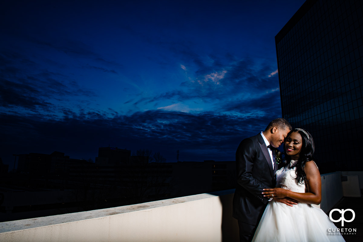 Bride and groom at sunset after their spring wedding at the Commerce Club.