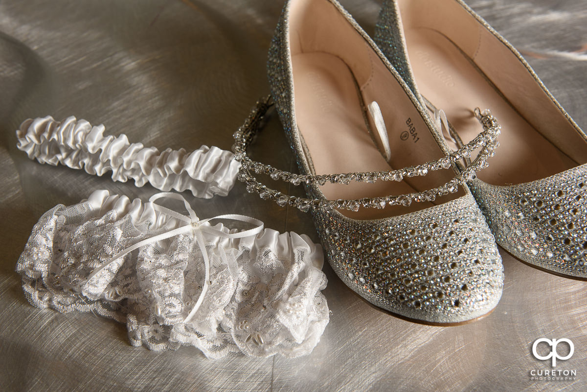 Bride's shoes and jewelry.