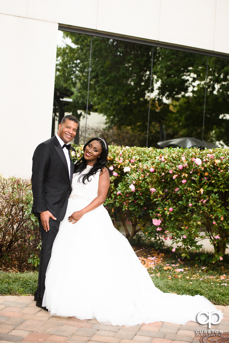 Bride and groom outside their spring wedding at The Commerce Club.