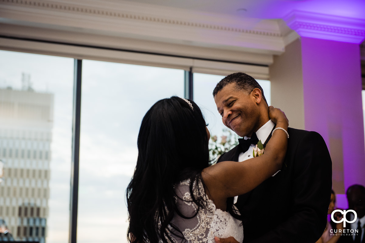 Groom and bride dancing at The Commerce Club.