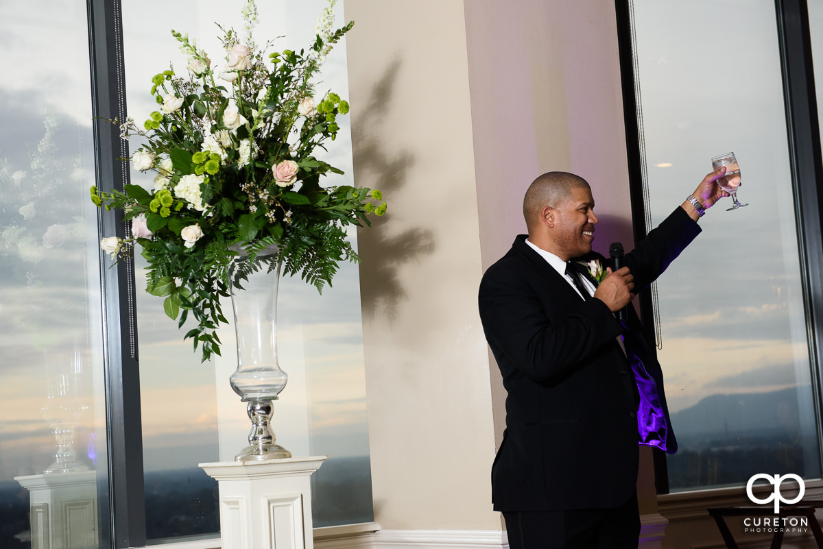 Groomsmen toasting the newlyweds.