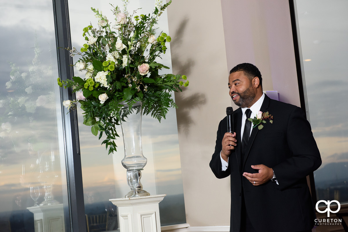 Groomsmen giving a speech.