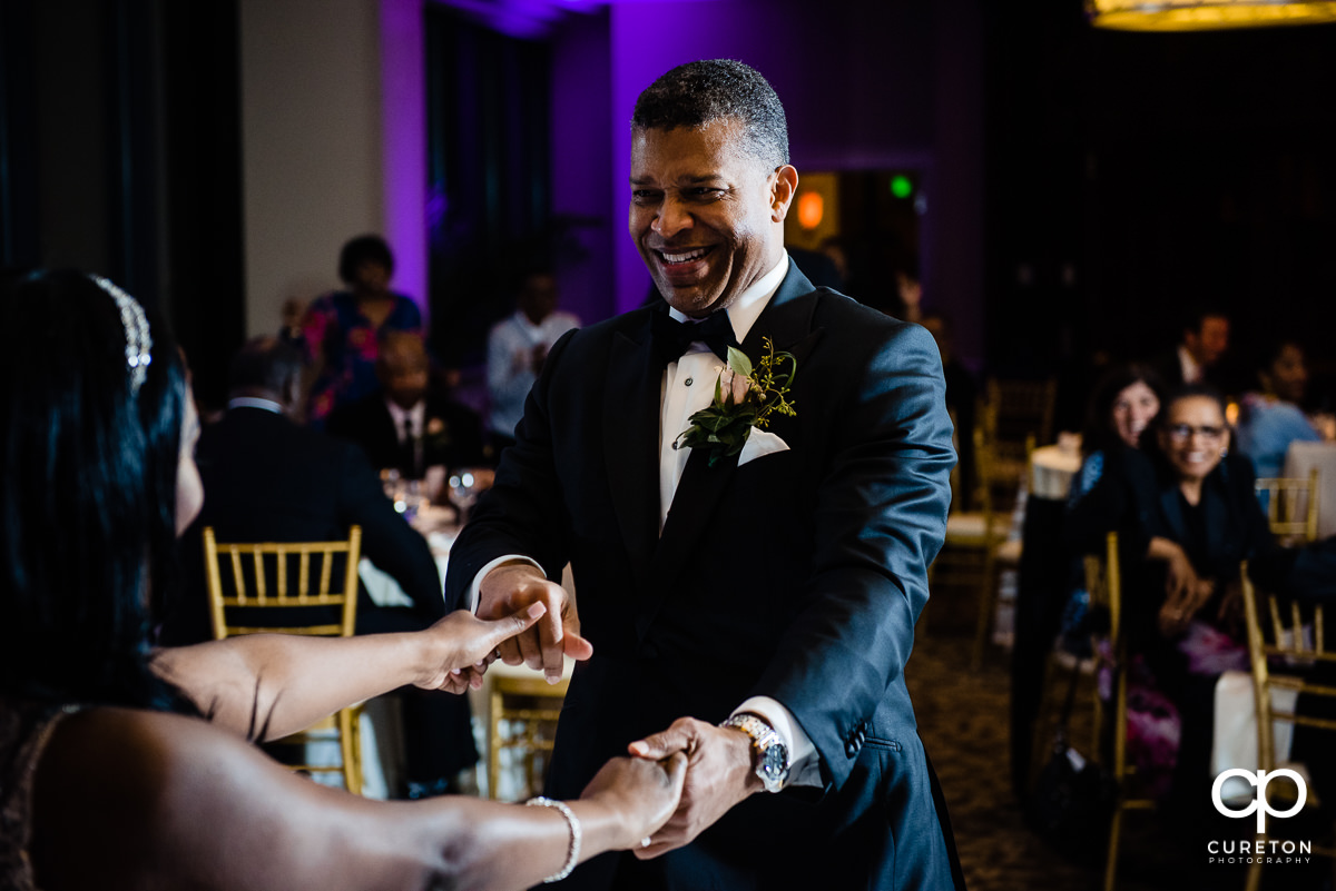 Groom on the dance floor at the Commerce Club reception..