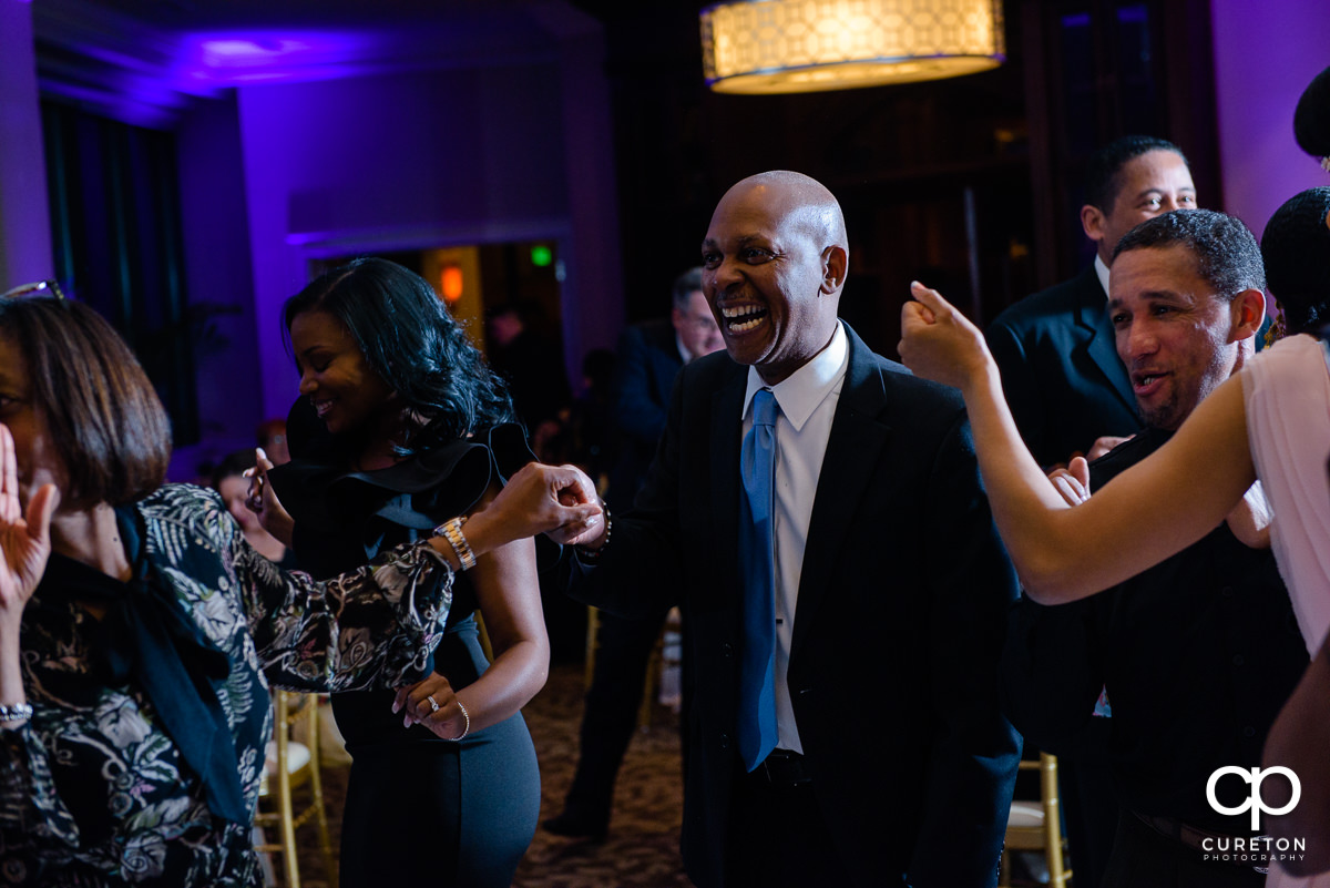 Wedding guests dancing the night away at The Commerce Club wedding reception.