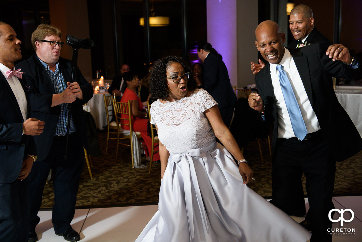 Wedding guests dancing the night away at The Commerce Club wedding reception.