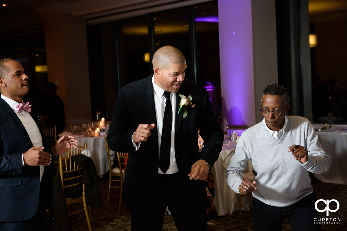 Wedding guests dancing the night away at The Commerce Club wedding reception.