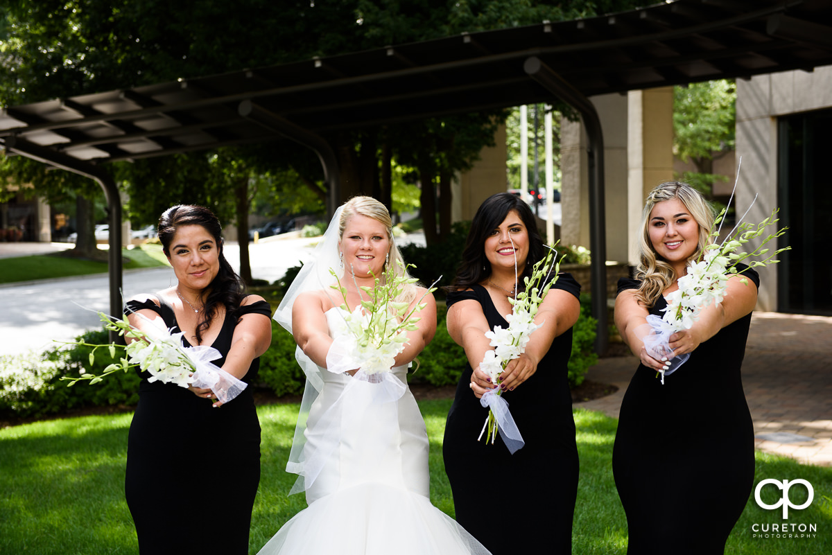 Bride and her bridesmaids outside the Commerce Club.