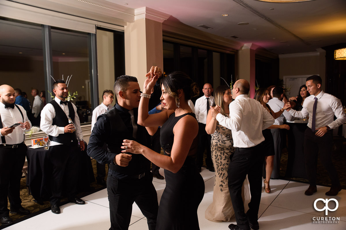 Wedding reception guests dancing at the Commerce Club.