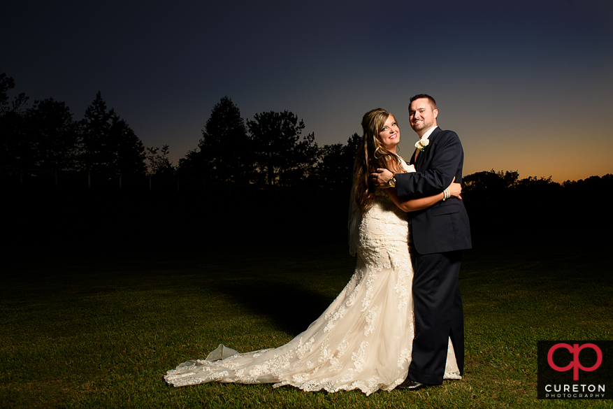 Bride and groom dancing at sunset after their Cowpens SC wedding at Mountain View Baptist..