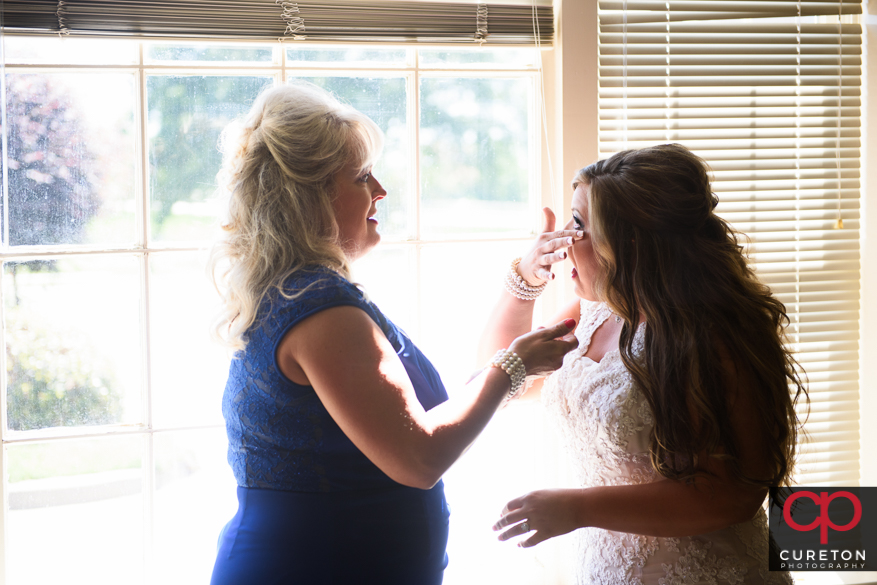 Bride and her mother before her wedding.