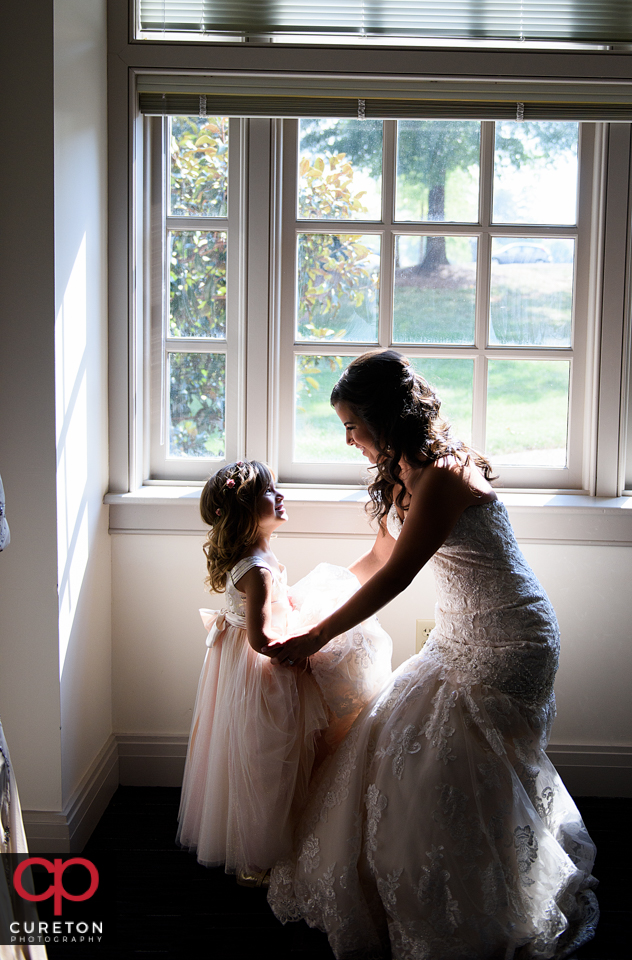 The bride and the flower girl at Daniel chapel.