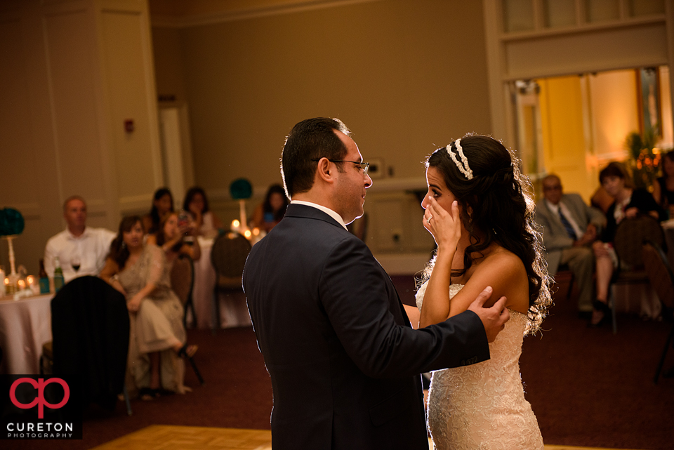 Broad dancing with her father at the wedding reception.