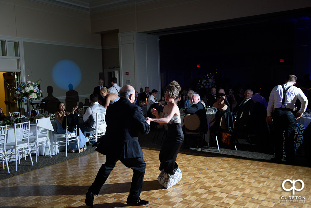 Bride's parent's dancing.