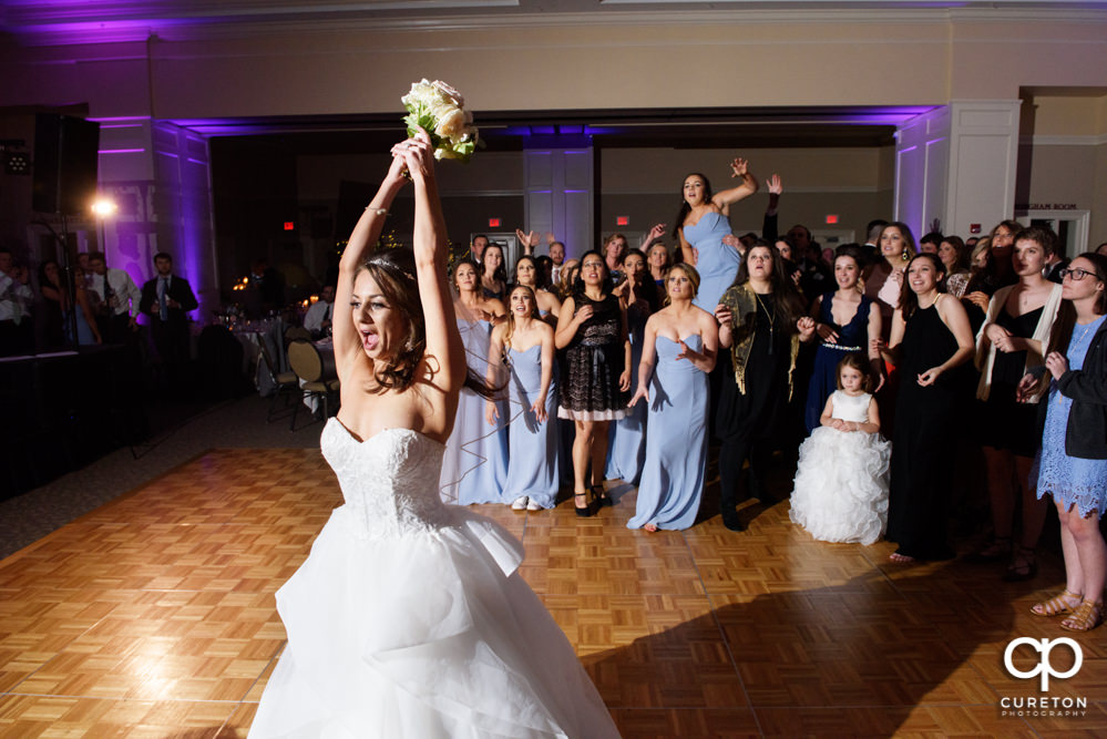 Bride tossing the bouquet.