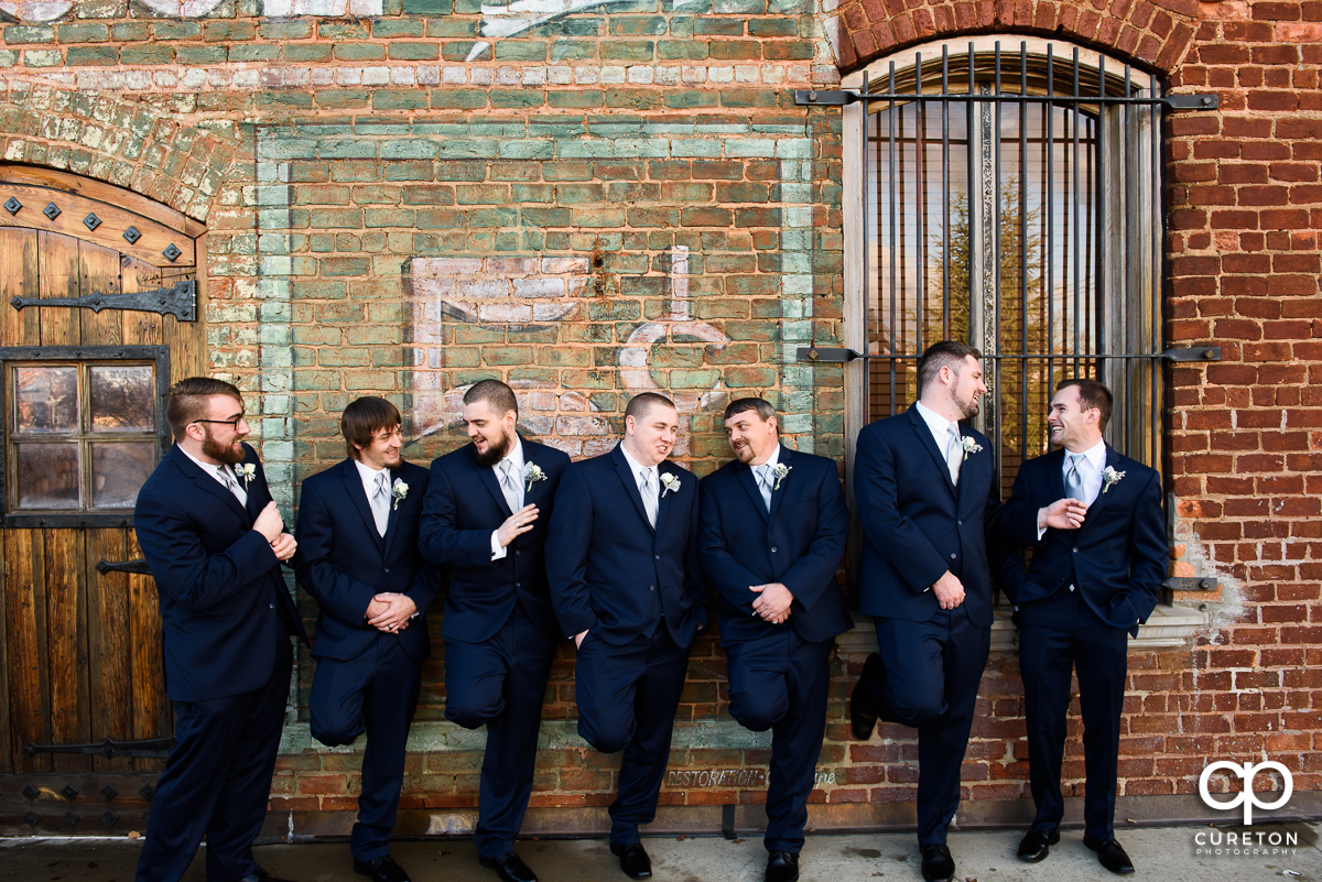 Groomsmen on the deck of the Old Cigar Warehouse.