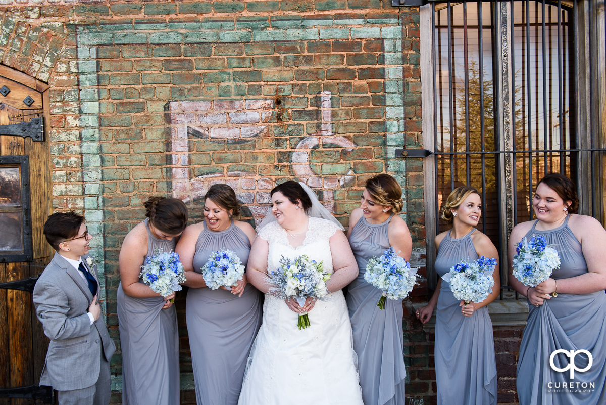 Bridesmaids having fun before the Old Cigar Warehouse wedding.