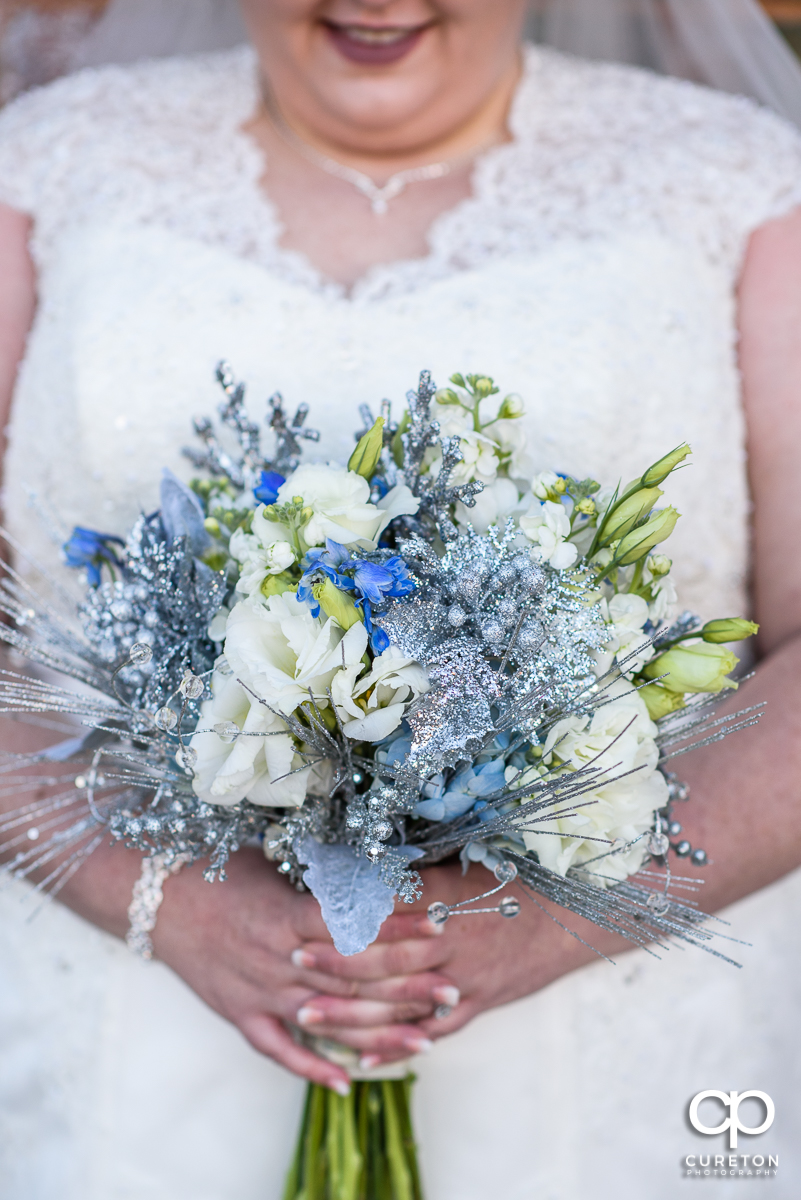 Gorgeous winter themed bridal bouquet by Renee Burroughs Design.