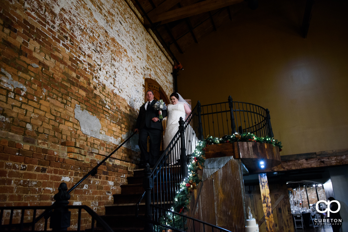 Bride making her grand entrance at her December Old Cigar Warehouse wedding.