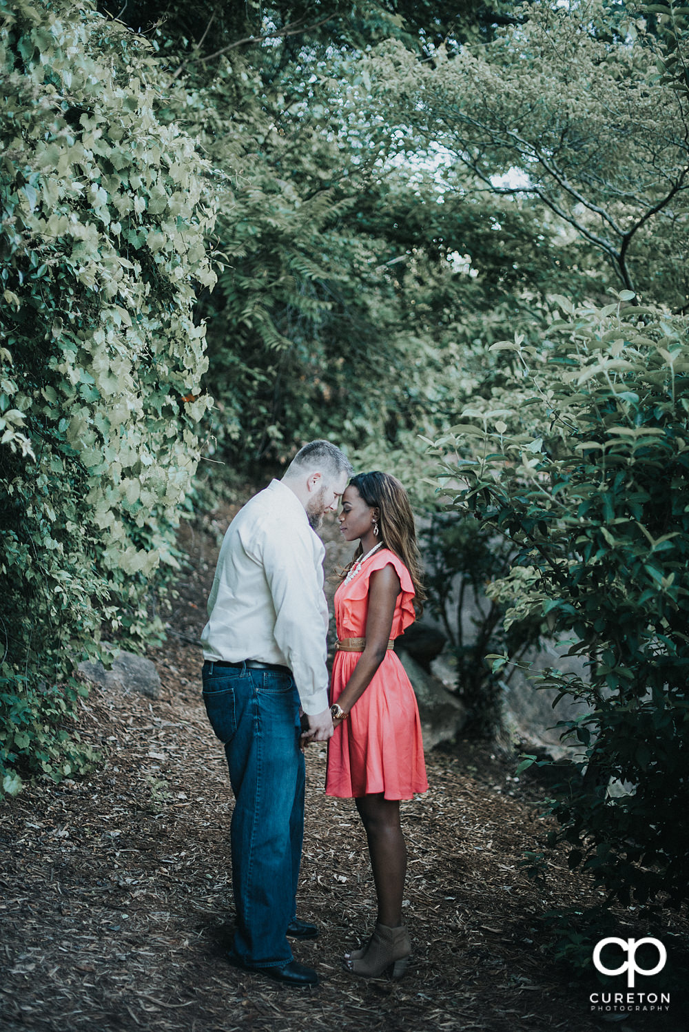 Bride and groom in a park in downtown Greenville.