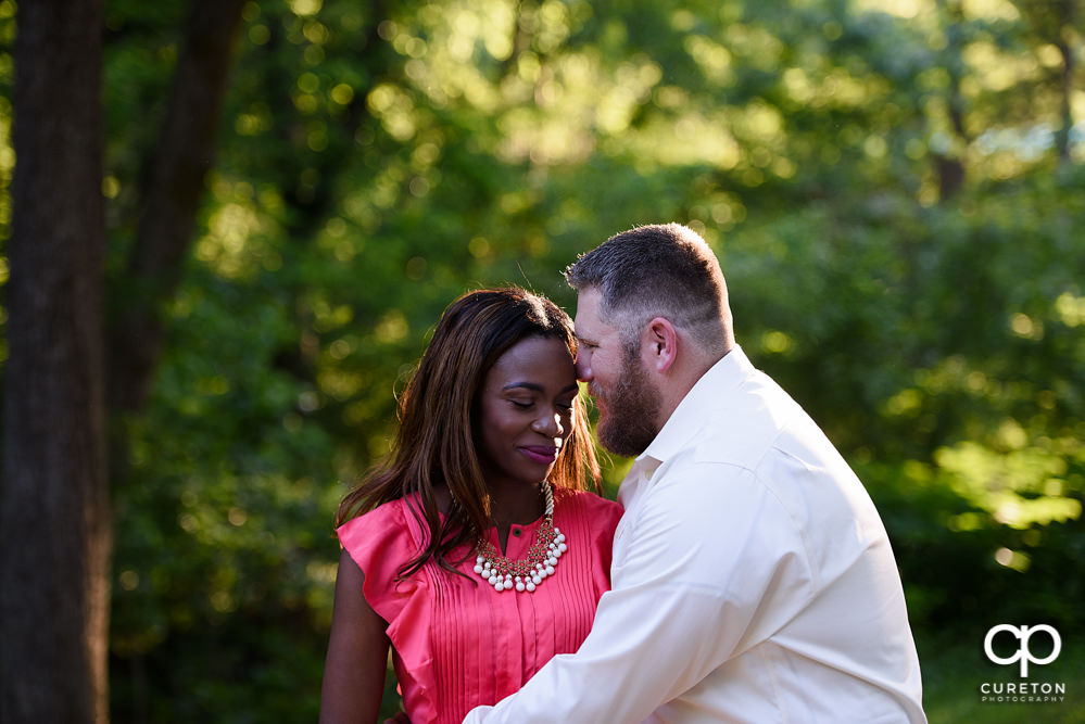 Bride and groom in the park.