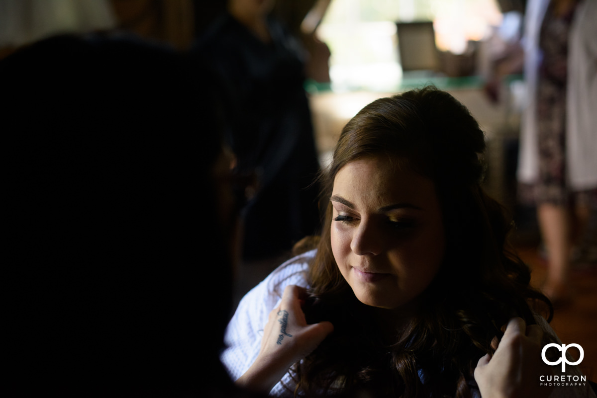 Bride having her hair and makeup done by Cotton Rouge.